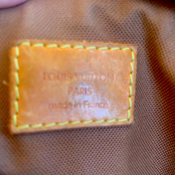 Authentic Louis Vuitton Tivoli with dust bag. - Picture 9 of 12